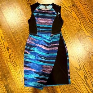 Bcbg Maxazria Black dress with cool color detail